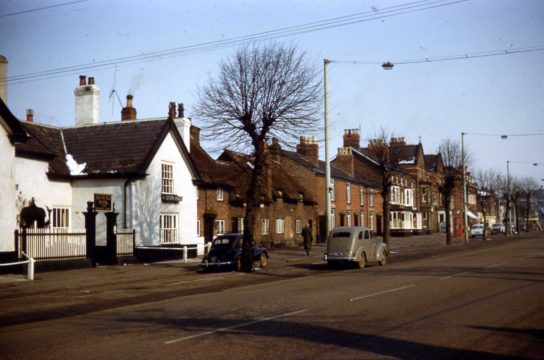 D4 012 Old Hall Hotel with thatched cottages beyond.jpg